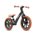 Black balance bike with a camel seat and grips