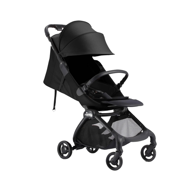 Black travel stroller with the seat reclined and the sun canopy extended forward