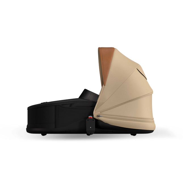 mima creo Mocha carrycot off the chassis, side view with the canopy extended