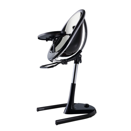 mima moon Black Chair with Snow White Seat in high chair mode, rear three-quarter view