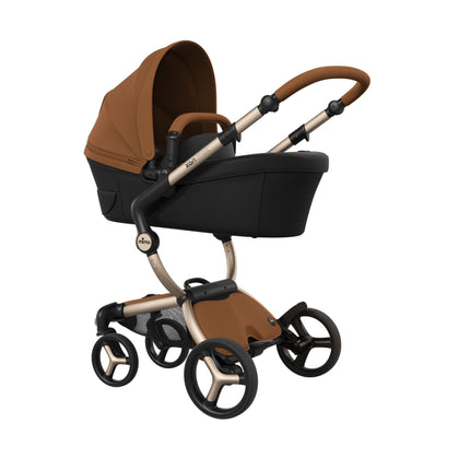 mima xari max Champagne chassis fitted with the Camel bassinet, marked as sold separately