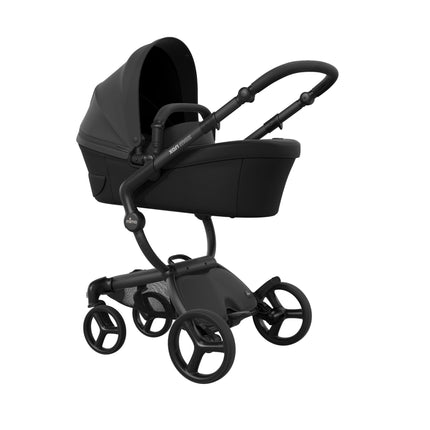 mima xari max Black stroller shown three-quarter on with the bassinet fitted, noted as sold separately