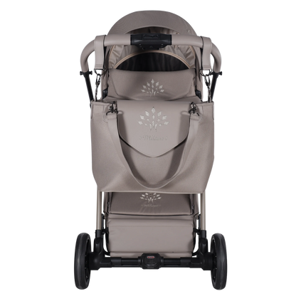 Junama Milano Cappuccino luxury stroller shown from newborn through toddler seating