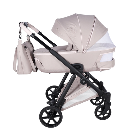 Studio photo of the Junama Milano Pink stroller with carrycot / bassinet