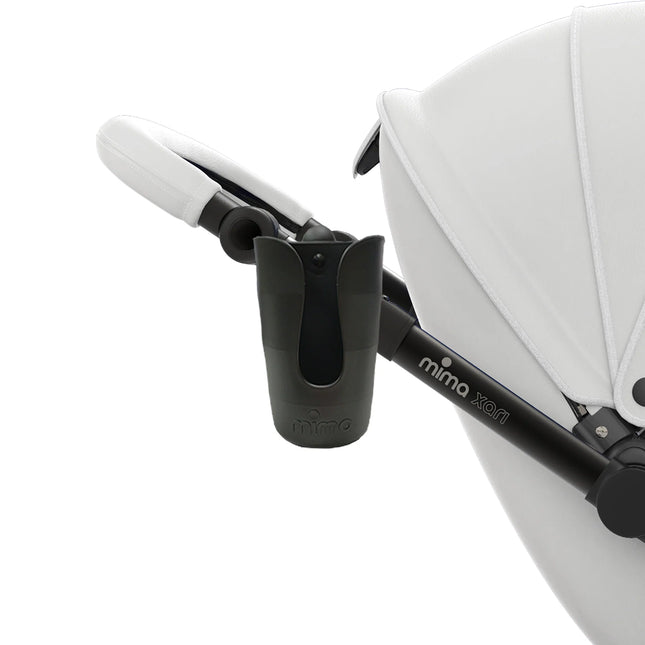 Black cup holder clipped to the handlebar of a white mima xari stroller