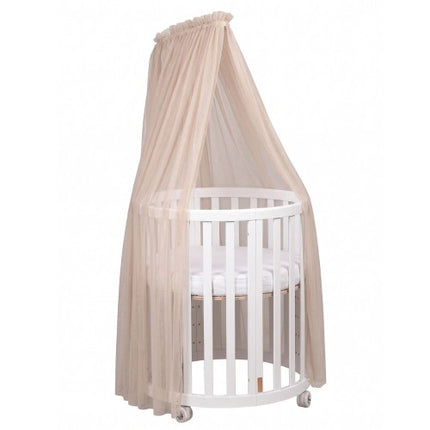 Beige Espiro Oasis canopy on the white frame, shown with the Oasis crib