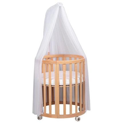 White Espiro Oasis canopy on the light wood frame, shown with the Oasis crib