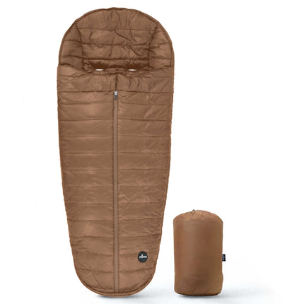 mima Compact Fold Footmuff in Mocha Cream shown flat next to its compact stuff sack