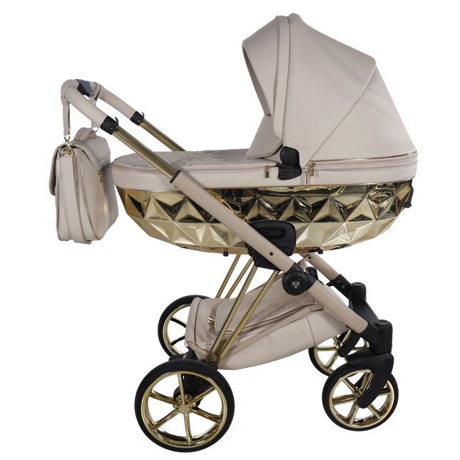Junama Cubby Premium Beige stroller with gold diamond carrycot