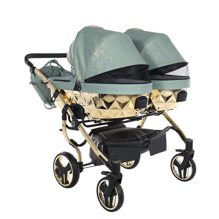 Carrinho de bebé lado a lado Junama Heart Duo verde e dourado com duas alcofas/berços, vista frontal