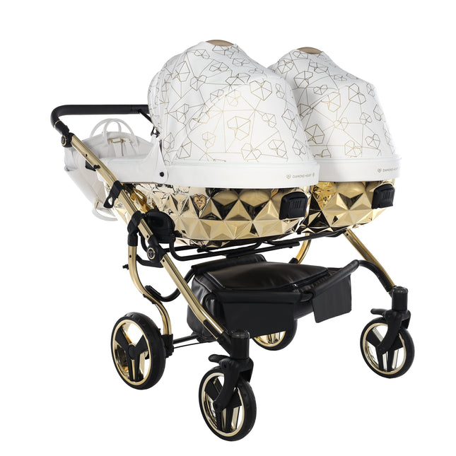 Junama Heart Duo White & Gold side-by-side stroller with two carrycots, side angle