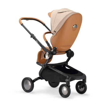 Rear three quarter view of the mima creo Mocha stroller showing the smooth seat shell and canopy zip