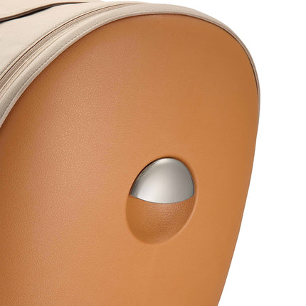 Close-up of the chrome button detail on the leatherette seat shell of the mima creo Mocha stroller
