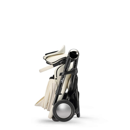 mima creo White stroller folded down to a compact freestanding package