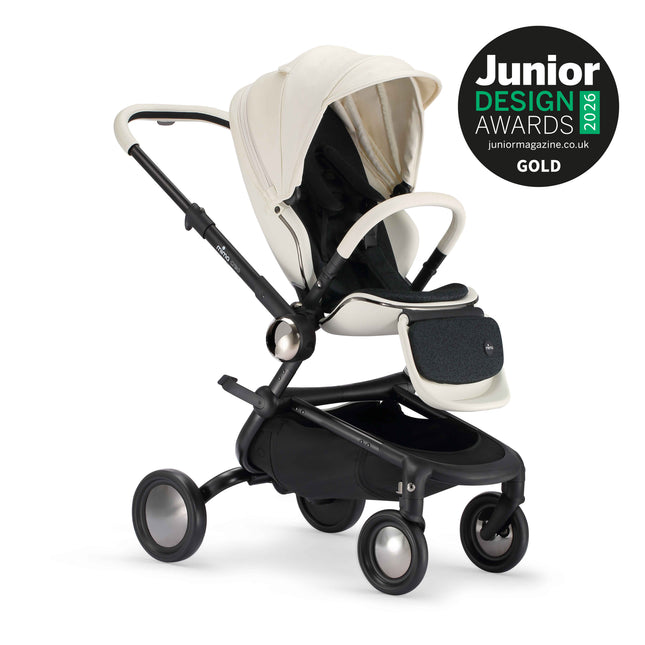 mima creo White city stroller at a three quarter angle next to the Junior Design Awards 2026 Gold badge