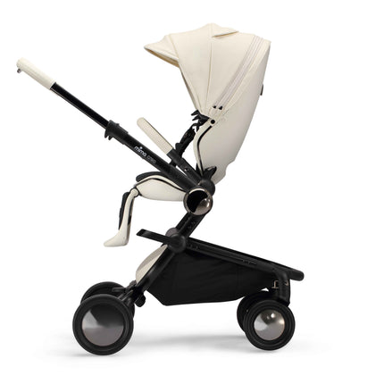 mima creo White stroller in parent facing mode with the seat upright, seen from the side