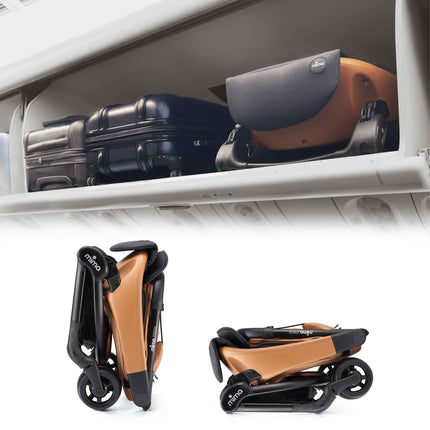 mima miro Mocha travel stroller folded in an airplane overhead bin, with two folded angles below