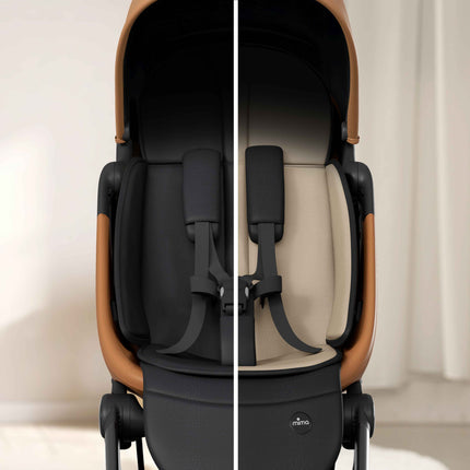 Split view of the reversible seat pad on the mima miro travel stroller, black side and beige side