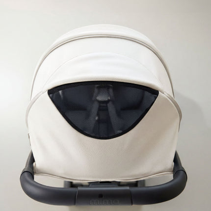 Canopy peekaboo mesh window on the mima miro White travel stroller seen from above
