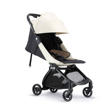 mima miro White travel stroller seen from the front with the canopy fully extended over a reclined seat