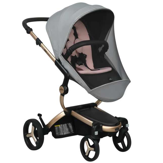 mima xari max mosquito net stretched over the seat and canopy, pink seat pad visible through the mesh